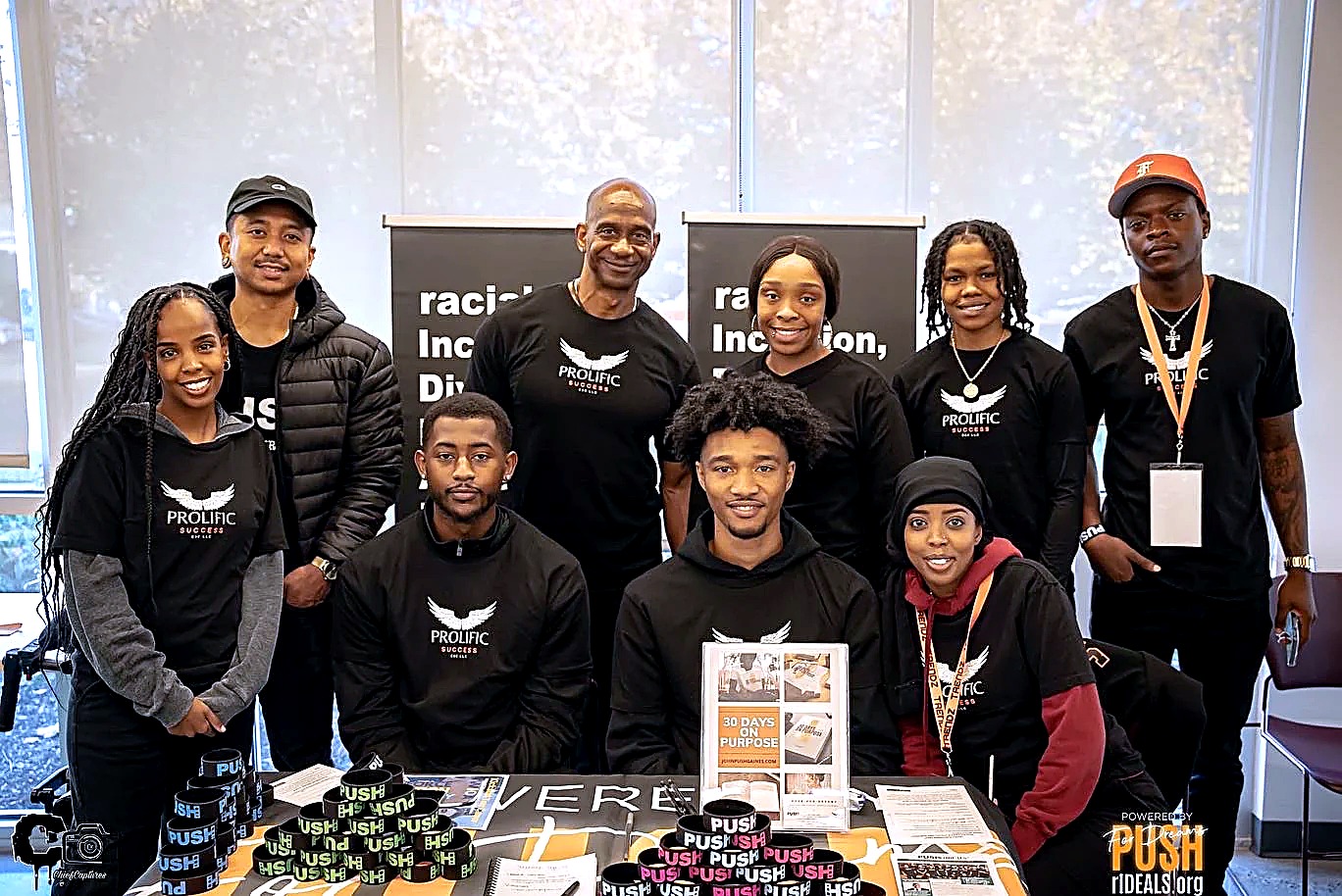 Prolific Success team at a community outreach event